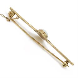 9ct gold opal bar brooch, set with a single oval cabochon cut opal