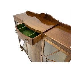 Mid-20th century Art Deco style walnut display cabinet, two central drawers over cupboard flanked by two bevel glazed display cabinets with sunburst astragal glazing, on ball and claw cabriole feet