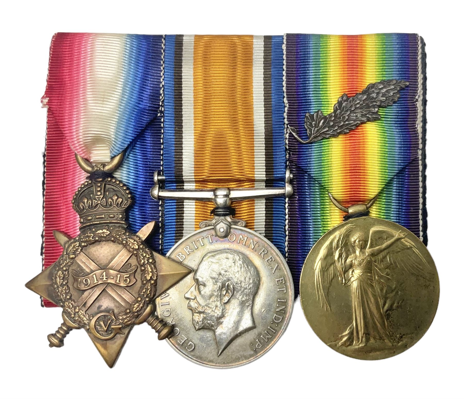 WW1 group of three medals comprising 1914-15 Star awarded to 1204 Pte. W.V. Furniss 20-London R. and British War Medal and Victory Medal with oak leaves awarded to Capt. W.V. Furniss; with ribbons; displayed on board for wearing; some biographical details