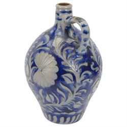 19th century German salt glazed flagon, decorated with foliage and floral sprigs, H36cm