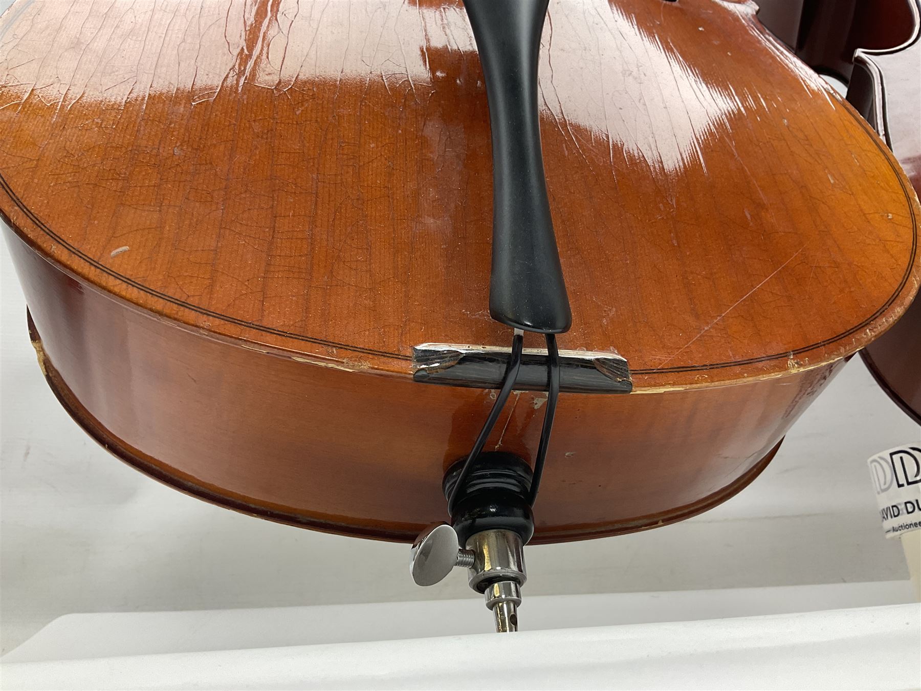 Modern Hungarian half-size cello with 69cm two-piece maple back and ribs and spruce top L114cm overall; and Stentor half size cello bearing label 'The Stentor Student II'; each in soft carrying case (2)