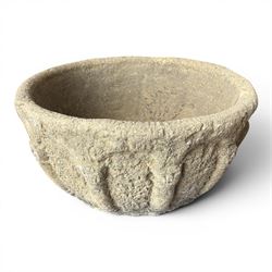 Large cast stone ecclesiastical style urn in the style of a baptismal font, featuring a hand-carved style exterior with Neoclassical columns in relief