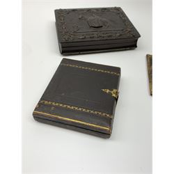 A Victorian ambrotype photograph in gilt surround and Vulcanite type Union case, decorated in low relief to front and verso with a female figure upon horseback, H12.5cm, together with a leather case daguerreotype, and a further loose example. (3).  