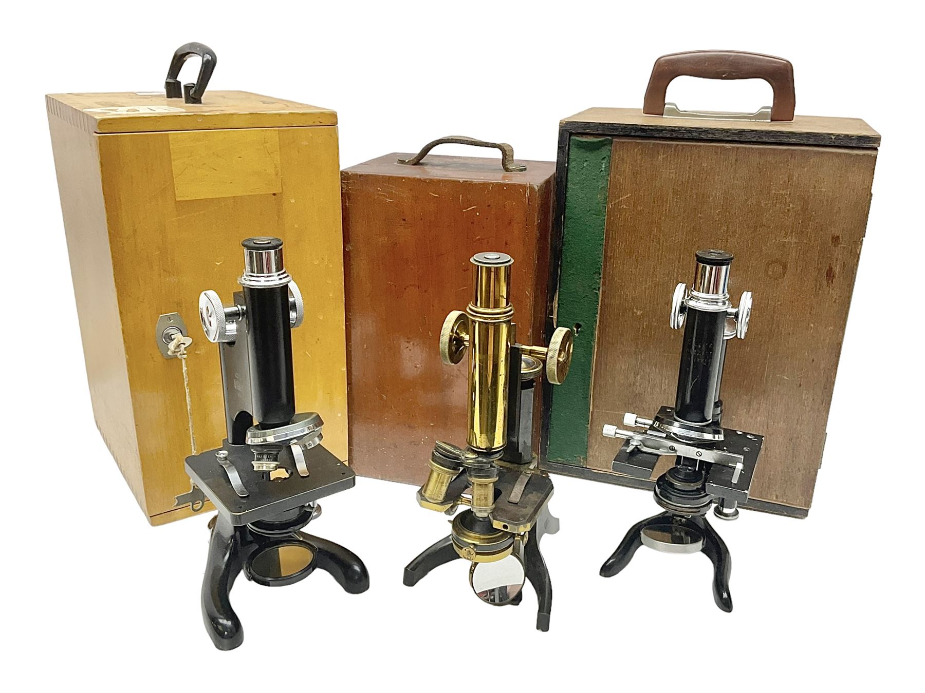 Three microscopes, comprising Swift and Son, Beck model 22 no 5512 amd E. Leitz Wetzlar no 113555, all boxed