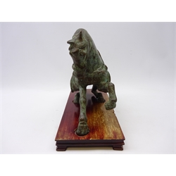  20th Century Chinese Tang Dynasty style bronze model of a Tang Horse, on hardwood base, L38cm x H26cm  