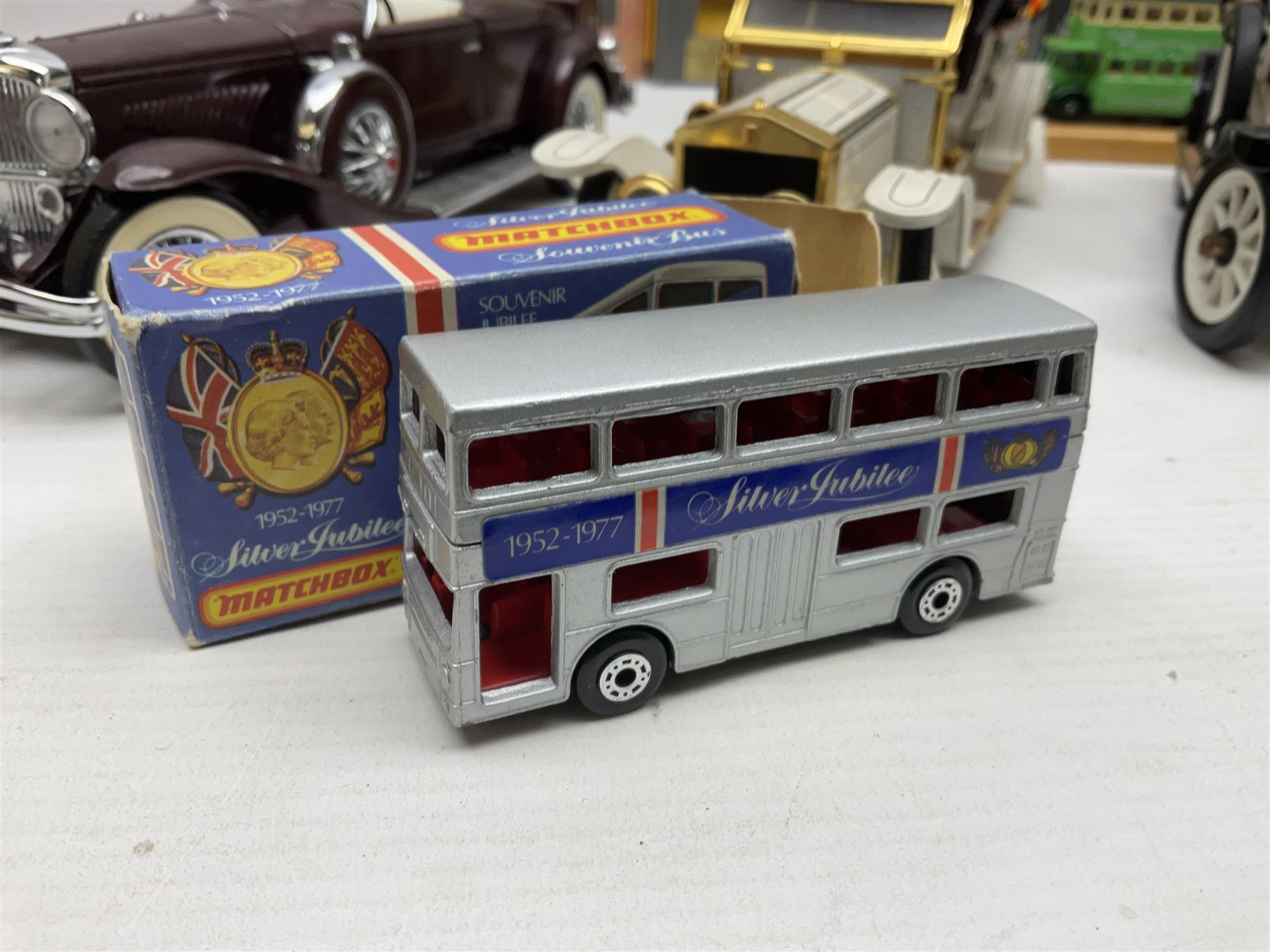 Four Franklin Mint 1:24 scale model cars, to include 1940 Duesenberg, 1912 Packard Victoria, 1935 Duesenberg and 1911 Rolls Royce, together with other diecast vehicles including Matchbox Models of Yesteryear, Lledo etc
