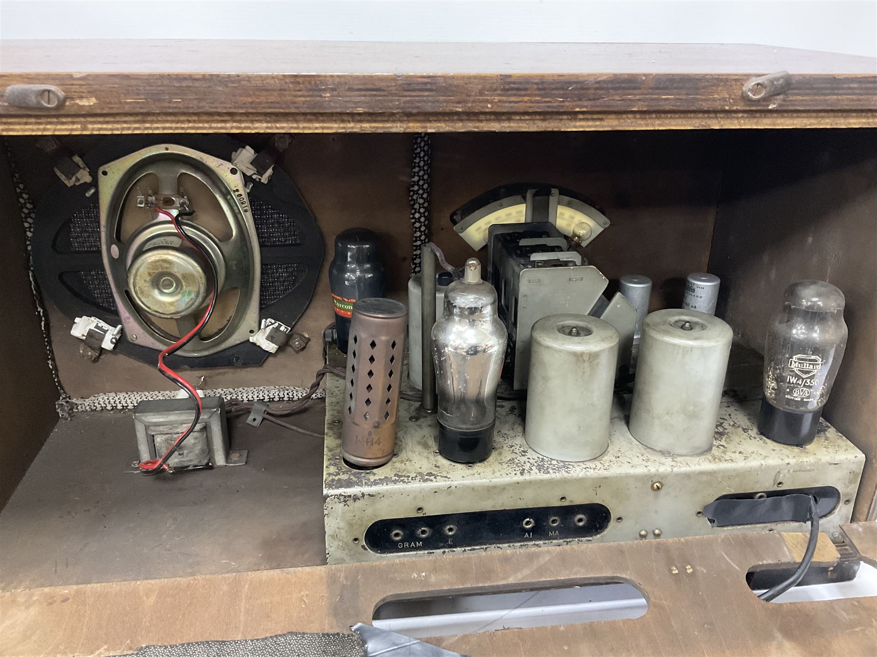 Two 1930s radios, comprising Art Deco Lotus valve example with copper fixtures, H50cm W37cm  together with a Swan Aerodyne example decorated with inlay