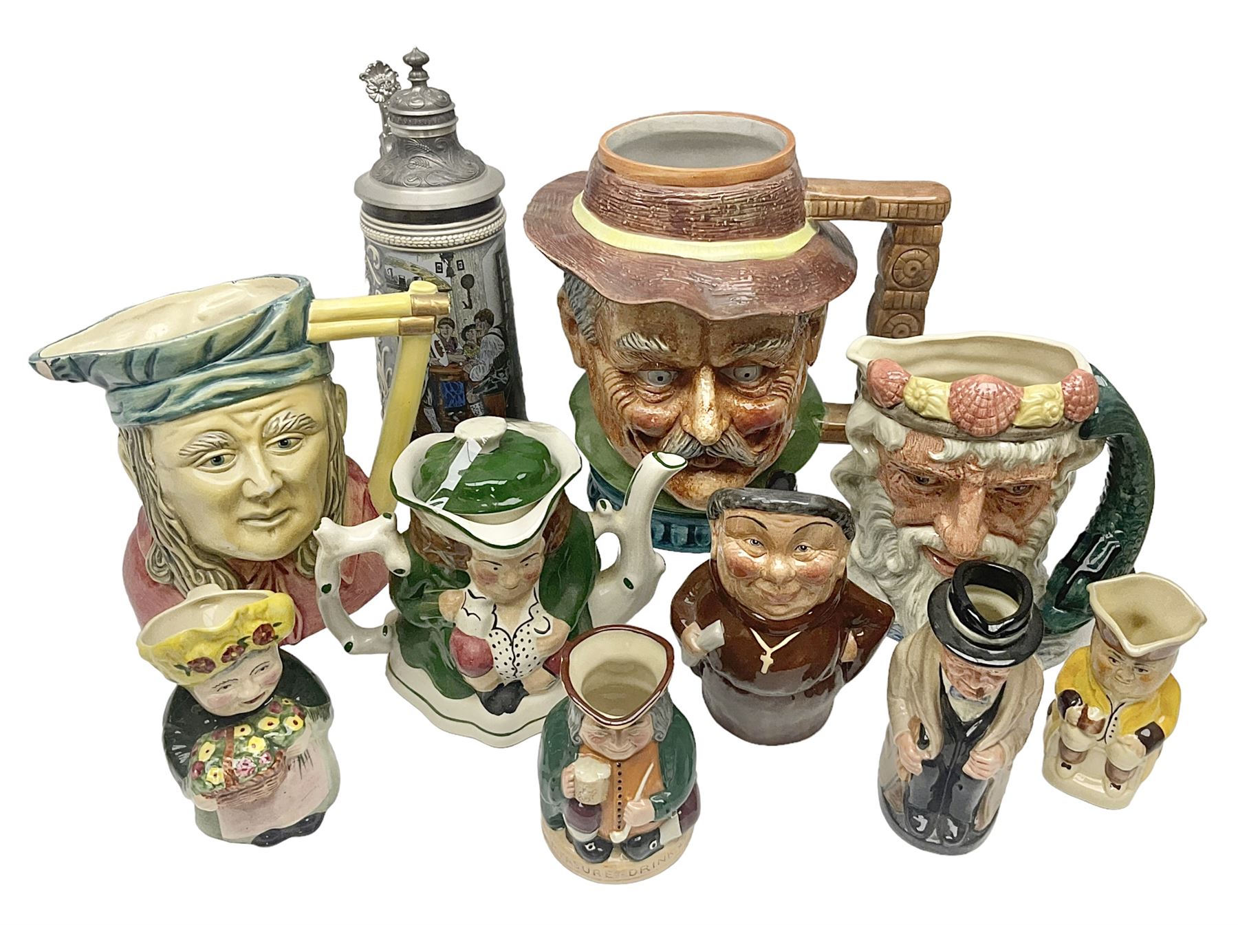 Collection of toby jugs and character jugs, to include Royal Doulton Winston Churchill and Neptune, together with Staffordshire Character Jugs examples  