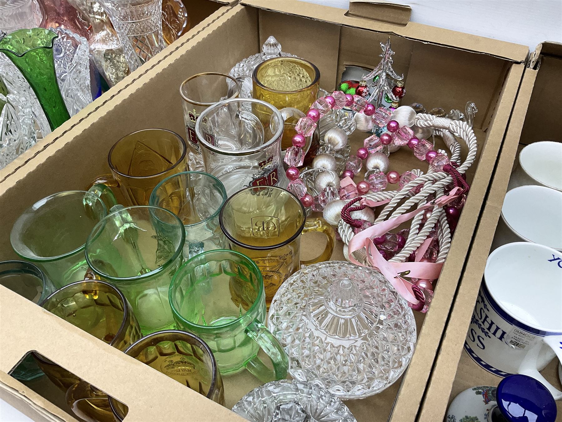 Large collection of glassware to include carnival glass, art glass paperweight, coloured glass, uranium glass, together with three covered steines, ceramic decanters etc, in four boxes 