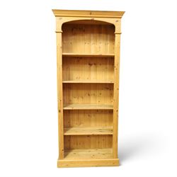Traditional pine bookcase, projecting cornice with four fixed shelves (H 33cm, D 29cm), fl...