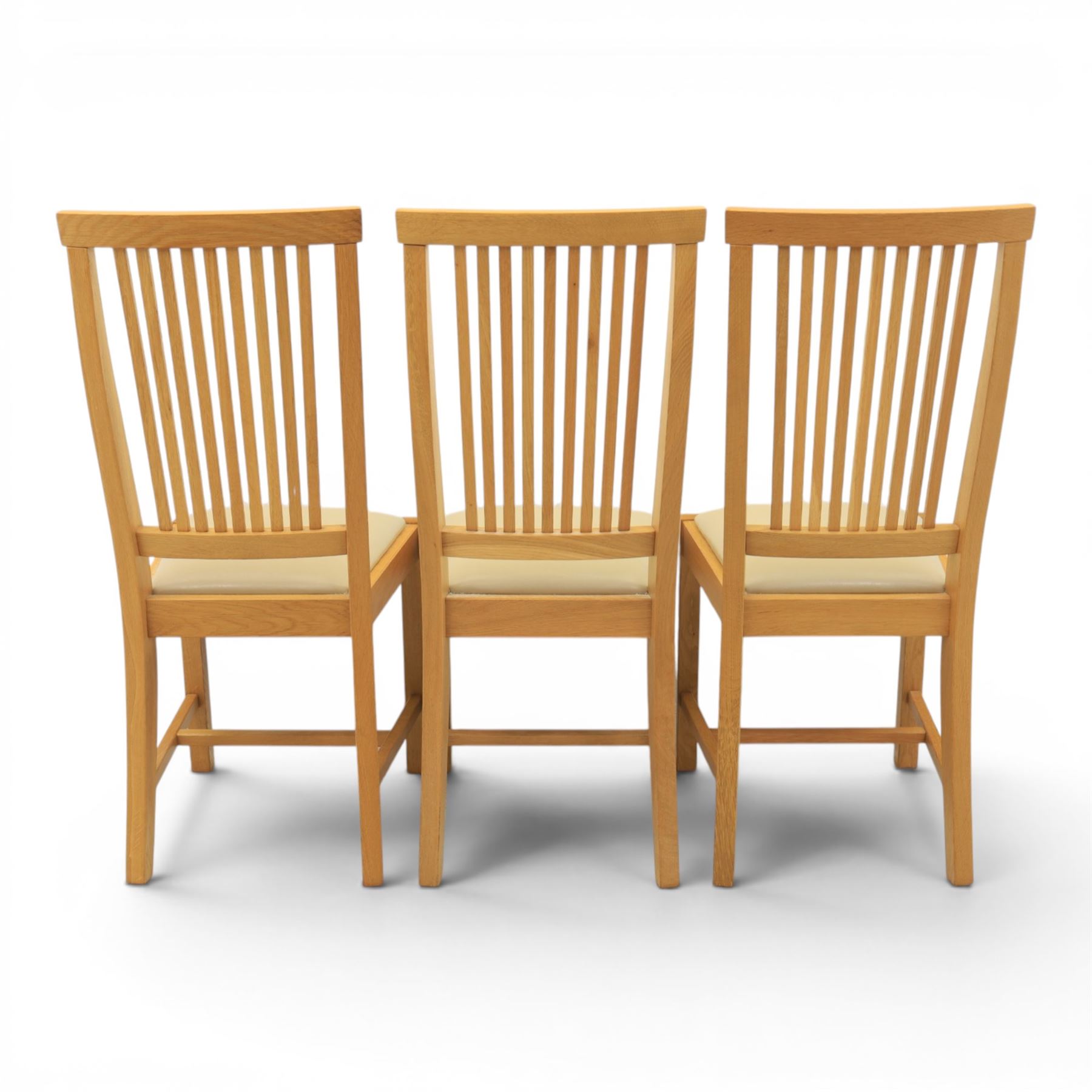 Contemporary oak dining extending table and set of six chairs, with additional leaf  extending to 182cm, chairs with cream upholstered seat