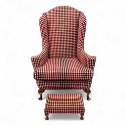 Late 20th century Georgian style wingback armchair with matching footstool, upholstered in red and cream geometric fabric, raised on cabriole front legs