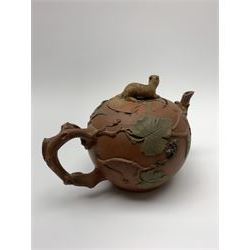 19th century Staffordshire redware teapot, with crabstock handle and spout, the body decorated with applied fruiting vines and squirrel figure, the cover with conforming squirrel finial, H10cm