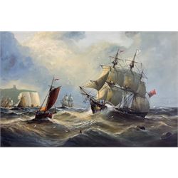 Michael J Whitehand (British 1941-): Shipping Off Scarborough in Heavy Seas, oil on canvas signed 60cm x 90cm