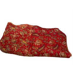 Embroidered bedspread with floral decoration on a red ground