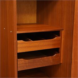 G Plan - 'Fresco' teak double fitted gentleman's wardrobe, twin doors enclosing two sections, a single clothes rail and drawers and shelving, on a recessed plinth base