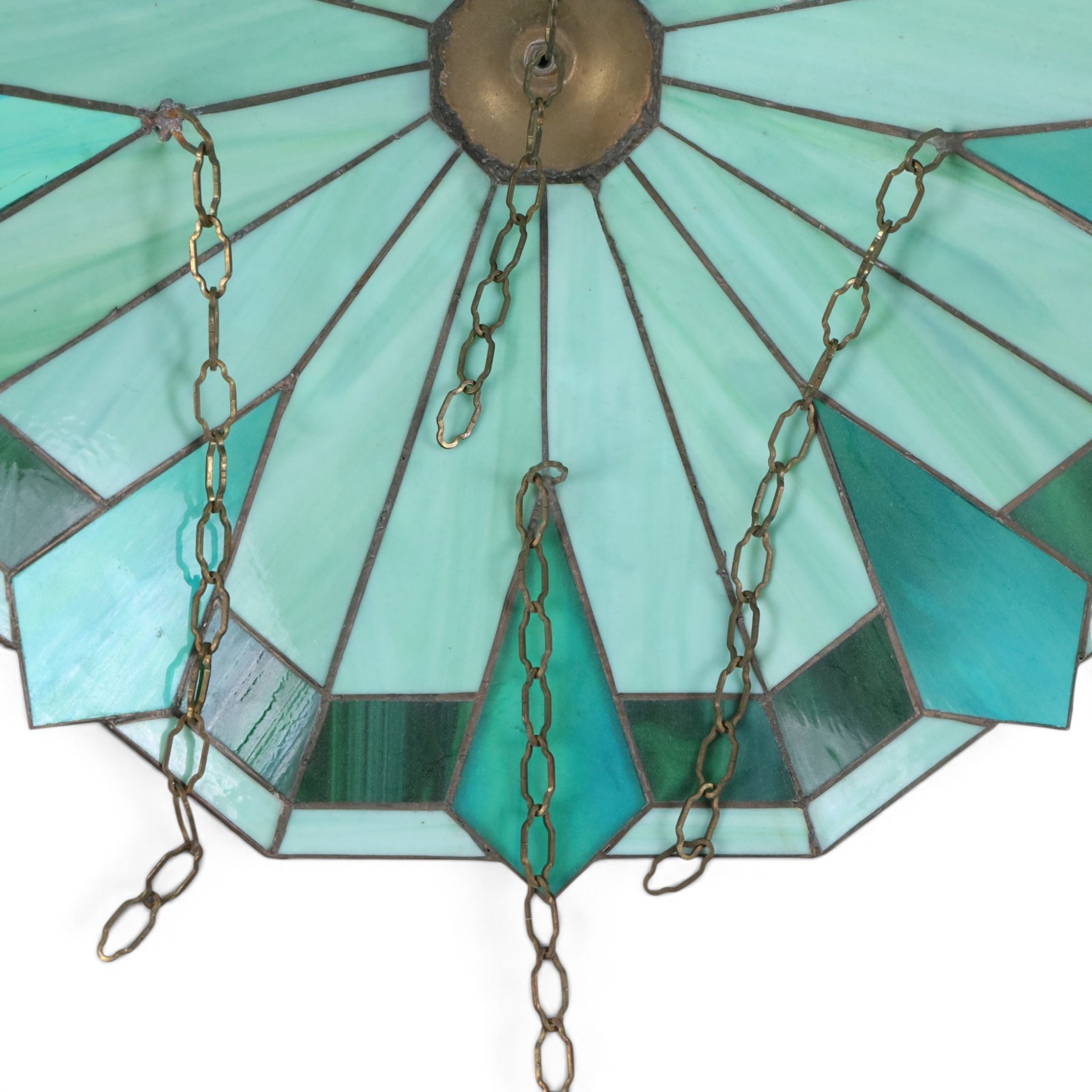 Pair of Tiffany style green stained glass shades with geomatic design, D50cm