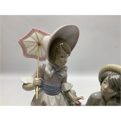 Three Lladro figures, comprising School Chums no 5237, For You no 5453 and Talk to Me no 5987, together with Lladro plaque Art Brings us Together no 7677, all with original boxes, largest example H22cm 