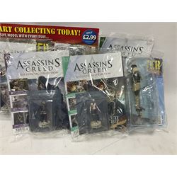 Fifteen Amer Czechoslovakia periodical issued metal models of helicopters each in unopened original packaging with copy of 'Helicopter Magazine'; together with seven unopened Hachette 'Assassin's Creed' periodical figures with magazines (22)