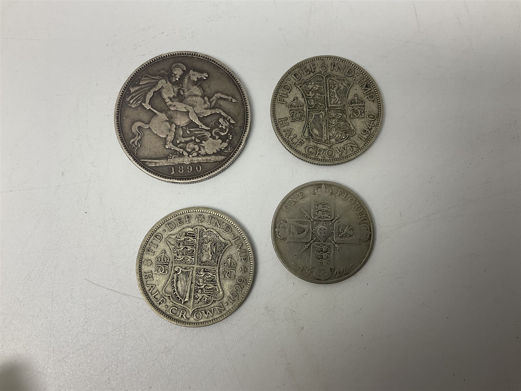 Queen Victoria 1890 crown coin, King George V 1929 half crown, 1922 florin, King George VI 1940 half crown, Bank of England Somerset five pound note 'HW30' and five one pound notes