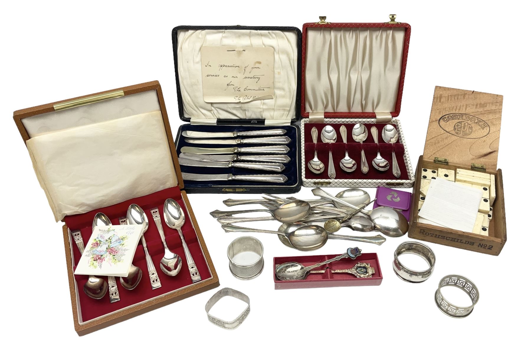 Group of silver to include cased set of six silver handled knives hallmarked Birmingham 1921 by Raeno Silver Plate Co, three hallmarked napkin rings etc together with silver plated and other metalware etc