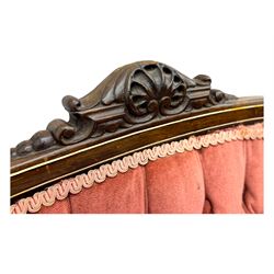 Edwardian inlaid rosewood parlour suite, comprising pair of tub shaped armchairs (W77cm, D69cm, H88cm); and matching two-seat sofa (W112cm, D69cm, H88cm), each with carved crest rails with shell motifs, deep button-tufted oval backs upholstered in pink fabric with braid trim, on cabriole supports