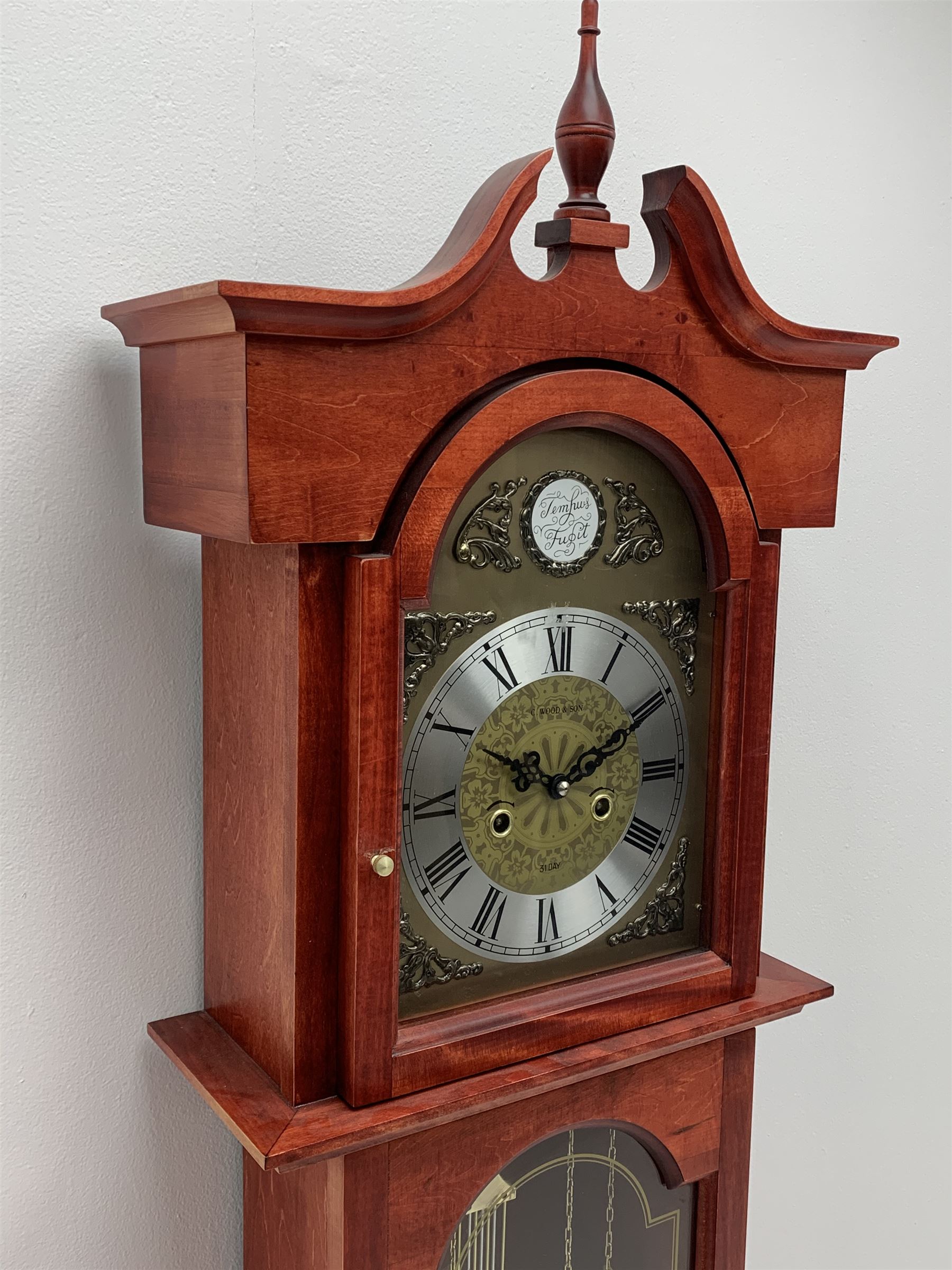 Contemporary stained beech longcase clock, Roman dial signed 'C. Wood & Son', 31-day twin train driven movement striking the hours and half on rods