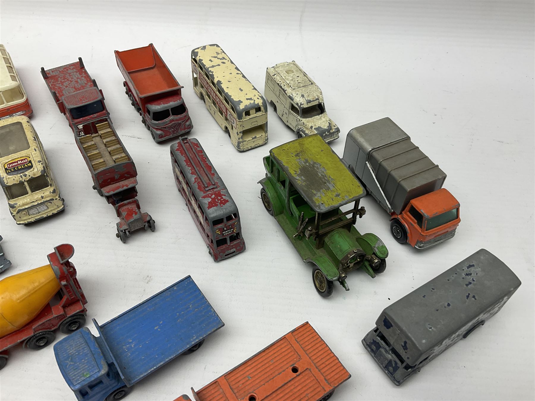 Lesney - approximately forty nine unboxed and playworn die-cast models of various scales with examples from the ‘Matchbox Series’ such as Mercedes Truck No.1, Mercedes Benz ‘Binz’ Ambulance No.2, Stake Truck No.4 etc; further models to include ‘Models of Yesteryear’ 1910 Benz Limousine Y-3, Bedford 7 1/2 Ton Tipper Van No.2, Ford Anglia No. 7 etc 