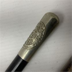 Three parade ground canes - malacca cane Coldstream Guards with plated mount engraved 'H.A. Myhan' L87cm; ebonised Church Lads Brigade 'Fight The Good Fight'; and mahogany stained Worcestershire Regiment (3)