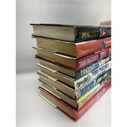 Collection of twenty-three hardback Terry Pratchett books, comprising approximately eighteen first editions including The Fifth Elephant signed & inscribed by Pratchett, all with dustjackets