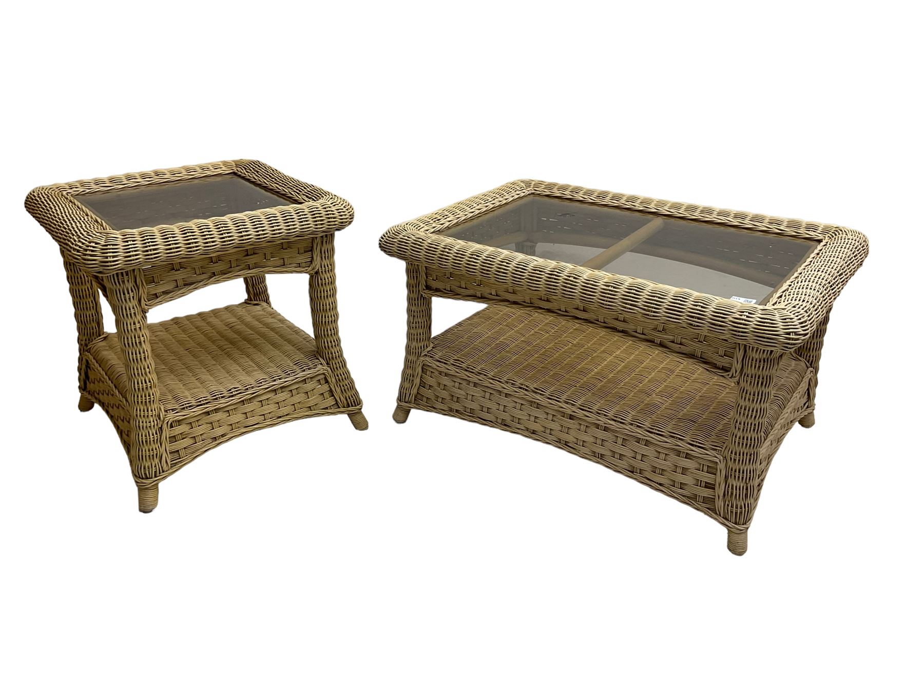 Contemporary rattan conservatory suite - two seat sofa with wicker frame and loose cushions upholstered in textured champagne fabric (W125cm H98cm); pair of matching armchairs (W72cm H98cm); rectangular glass-topped coffee table with rattan frame and undertier (W85cm D60cm H47cm); and matching square side table (W53cm H55cm)