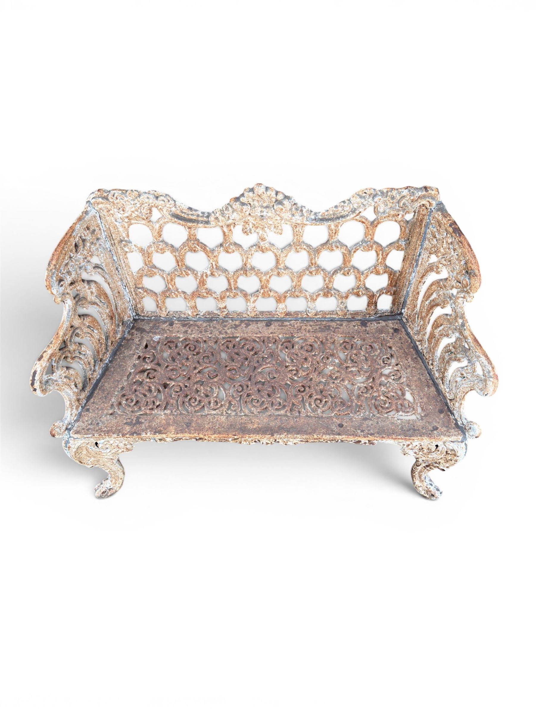 Victorian revival Carron Foundry design heavy cast iron two seat garden bench, scrolled arms with pierced lattice seat, finished in antique white paint