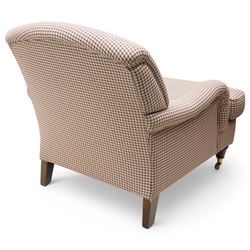 Laura Ashely - Howard design hardwood-framed armchair, upholstered in checkered fabric, on turned front feet with brass cups and castors 