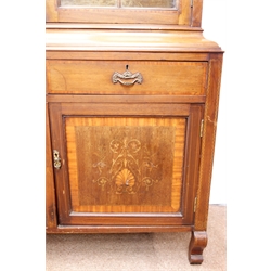  Edwardian inlaid mahogany display cabinet, inverted cornice, two glazed doors enclosing glass shelves above two drawers and two cupboard doors, scrolled supports, W111cm, H191cm, D37cm  