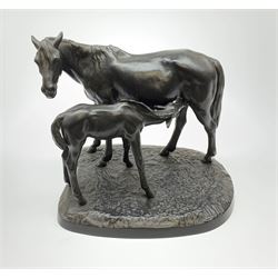 A Russian bronzed cast iron group of a horse and foal, signed to base, overall H30cm. 