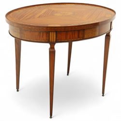 Aldam Heaton & Co (fl.1878-97) - late 19th century Sheraton revival style satinwood inlaid oval centre table, raised inlaid edge, centre with finely executed large central  inlaid medallion, surrounded by ribbon tied swags interspaced with medallions, frieze with rectangular symmetrical panels of foliate sprays of acanthus leaves, raised on four square section tapering legs with cavetti shaped shoulders with stringing on brass bulb feet, underside with bone plaque signed Aldam Heaton & Co, Baker St, London