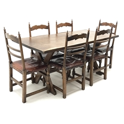 Spanish style rectangular oak dining table, 'X'  shaped supports joined by single stretcher (W168cm, H76cm, D79cm) and set six ladder back dining chairs with studded leather seats (W47cm) (7)  