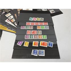 Queen Elizabeth II mint decimal stamps, housed on stock cards, face value of usable postage approximately 350 GBP