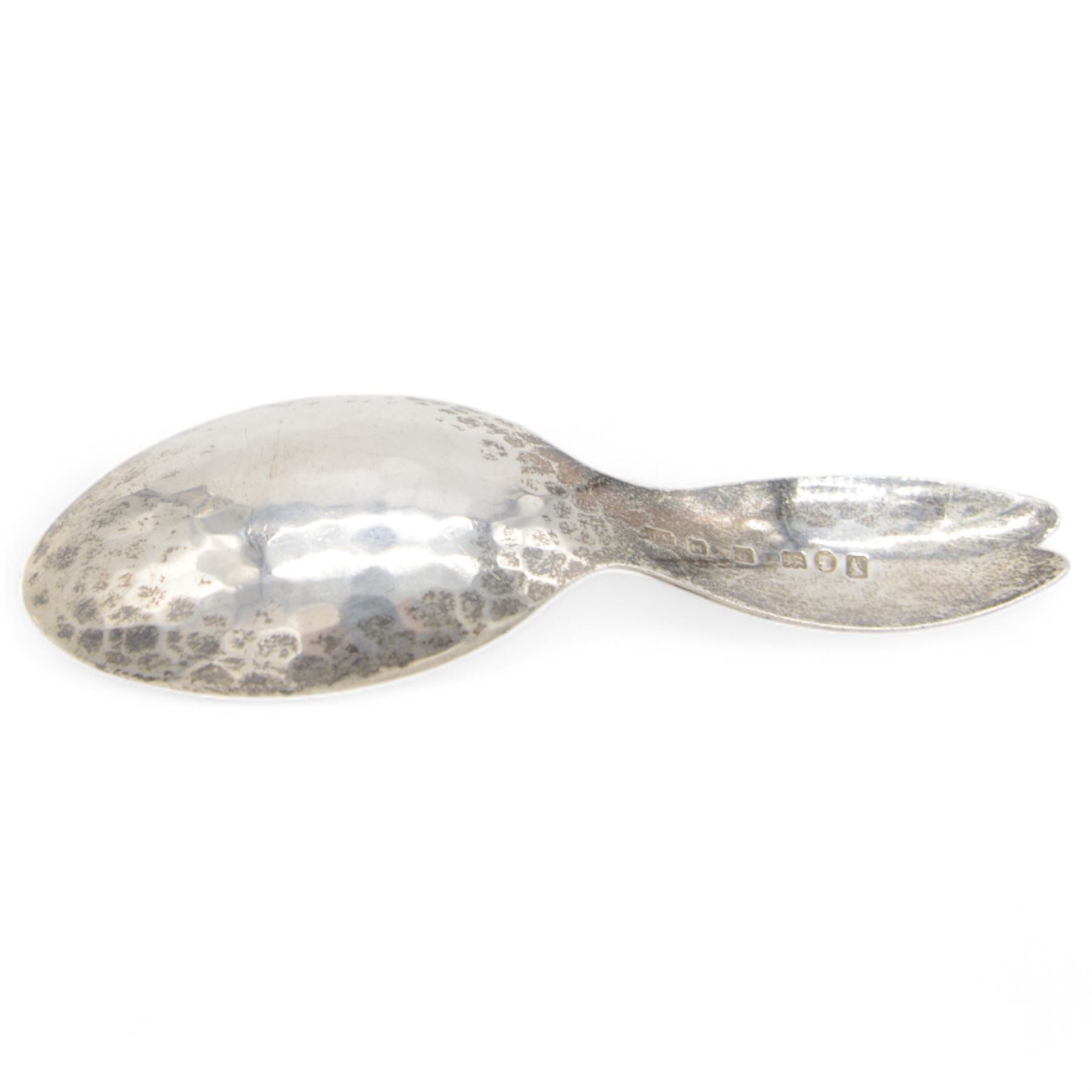Arts and Crafts silver rabbit caddy spoon, the face engraved to the hammered oval bowl, with the handle formed as the rabbit's ears, hallmarked Henry George Murphy, London 1934, with Murphy's Falcon stamp, L10cm