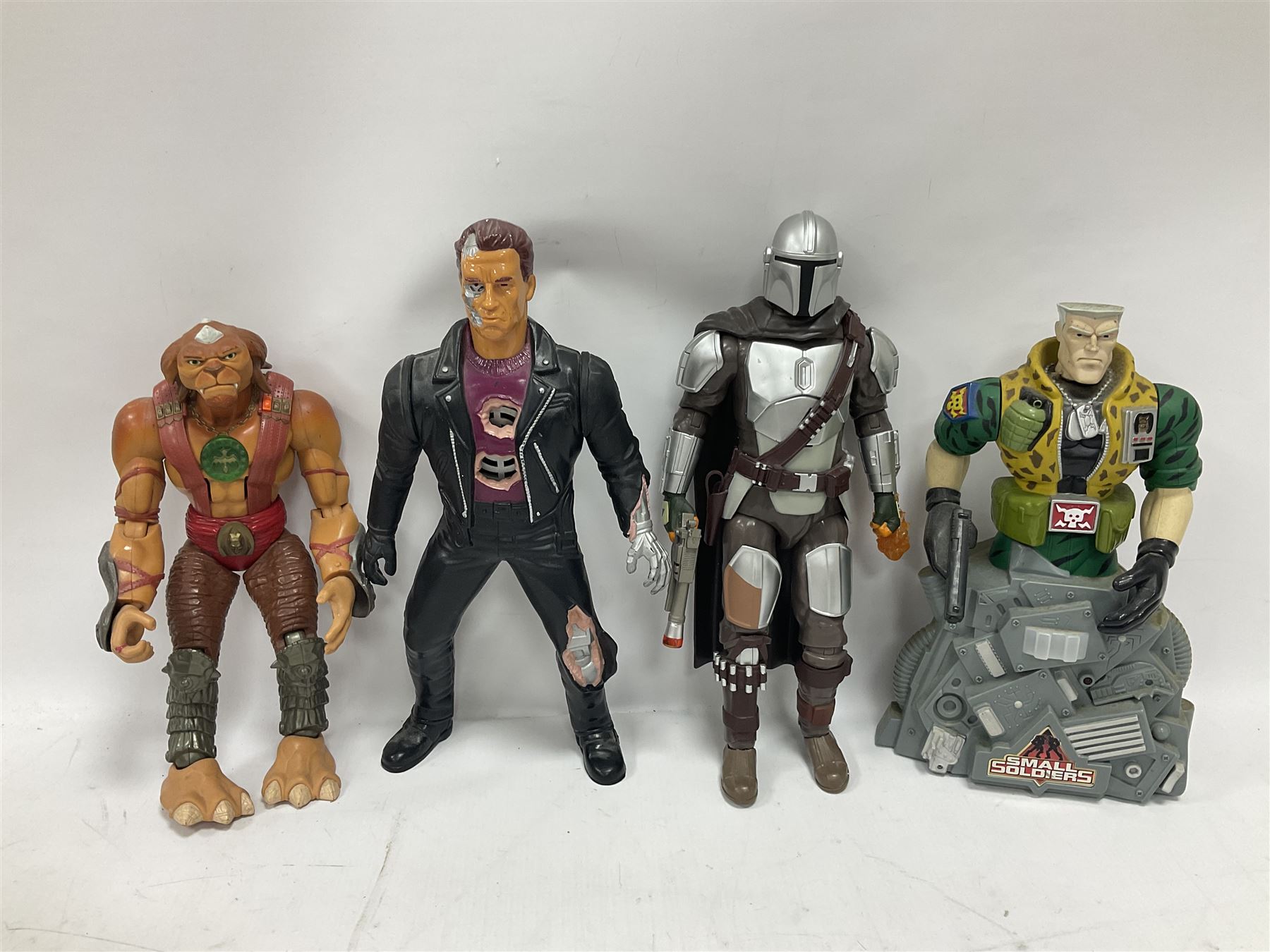 Small Soldiers - Revell 1:18 scale die-cast model of a Pontiac; boxed; and nine various sized loose action figures; together with nine other loose action figures including 'The Terminator' by Kenner (19)