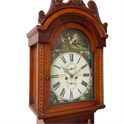 A Scottish longcase clock c 1890 in a contrasting light and dark mahogany veneered case, hood with a carved and crested pediment with a break arch door flanked by inlaid parquetry work, with a short trunk door and applied cushion mouldings, door flanked by half-turned applied columns on a square pediment with a recessed panel, fully painted break arch dial with spandrels representing the united kingdoms of Scotland, England, Ireland and Wales with a depiction of Robert Bruce to the arch, dial with Roman numerals ,minute track, subsidiary calendar dial and seconds dial with matching stamped brass hands, dial inscribed “J Cuthill, Beeth”, with an eight day striking movement,  striking the hours on a cast bell. With pendulum and two flat weights. 
John Cuthill is recorded as working as a watchmaker and clockmaker at 36 Eglington Street, Beith, Ayrshire. 1893.  
