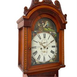 A Scottish longcase clock c 1890 in a contrasting light and dark mahogany veneered case, hood with a carved and crested pediment with a break arch door flanked by inlaid parquetry work, with a short trunk door and applied cushion mouldings, door flanked by half-turned applied columns on a square pediment with a recessed panel, fully painted break arch dial with spandrels representing the united kingdoms of Scotland, England, Ireland and Wales with a depiction of Robert Bruce to the arch, dial with Roman numerals ,minute track, subsidiary calendar dial and seconds dial with matching stamped brass hands, dial inscribed “J Cuthill, Beeth”, with an eight day striking movement,  striking the hours on a cast bell. With pendulum and two flat weights. 
John Cuthill is recorded as working as a watchmaker and clockmaker at 36 Eglington Street, Beith, Ayrshire. 1893.  
