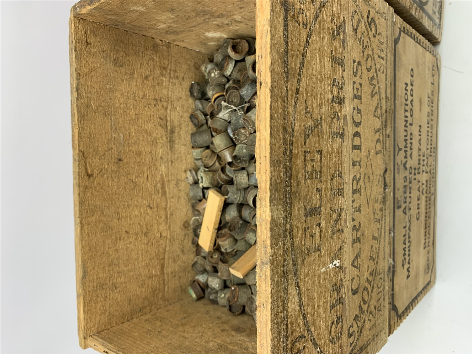 Four vintage Eley cartridge wooden crates each with stencilled decoration 35 x 24 x 23cm; now containing old used metal cartridges and caps etc (4)
