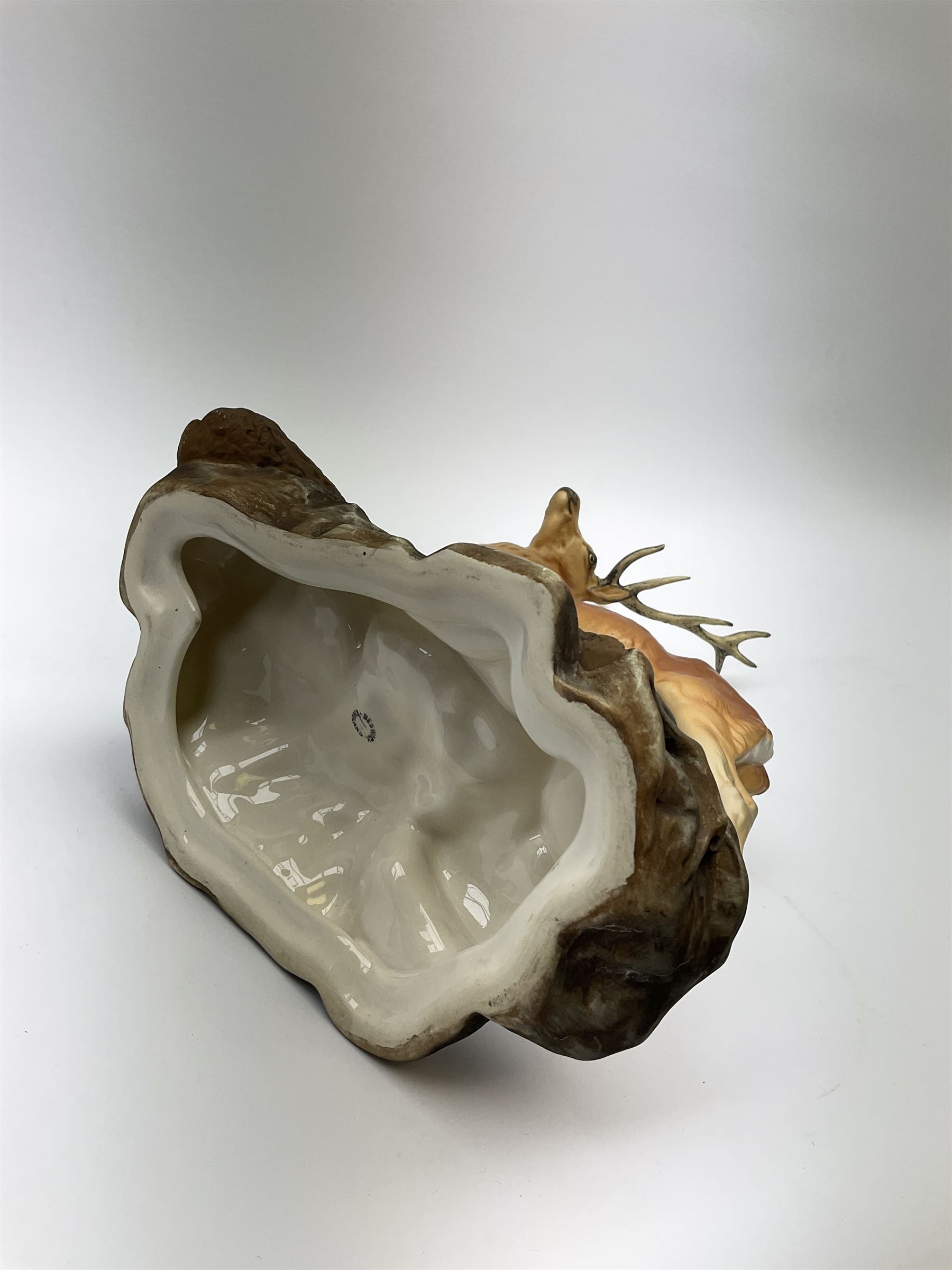 A Beswick Connoisseur matt model of a Stag upon a rocky modelled base, 2629