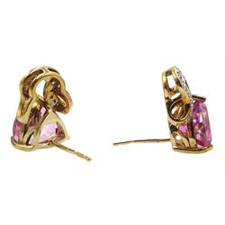 Pair of gold trillion cut flamingo topaz and and diamond stud earrings and a flamingo topaz pendant, all hallmarked 9ct