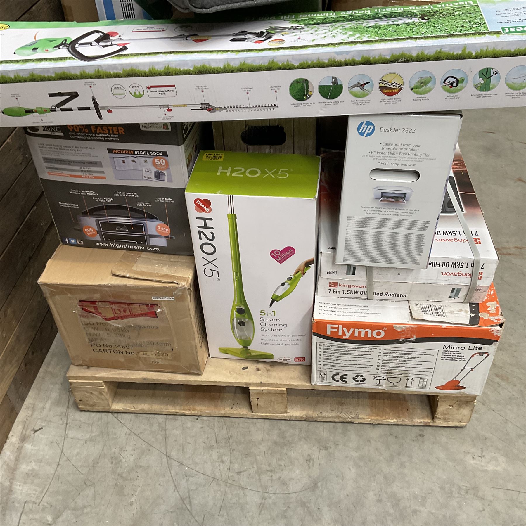 Collection of boxed items including a Flymo Micro Lite lawn mower, HP printer, Daewoo Halogen Air Fryer, an oil filled radiator etc