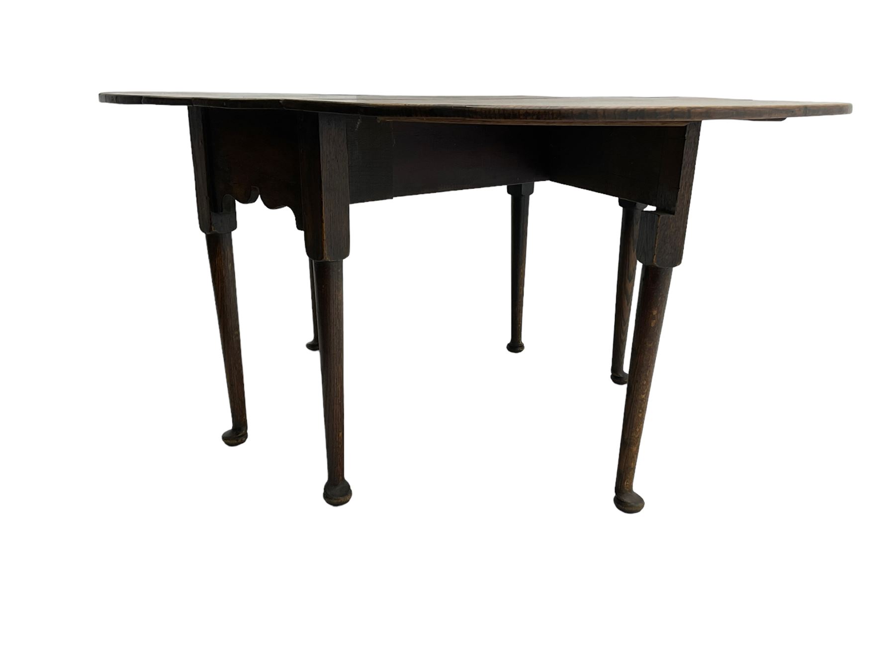 George III oak drop-leaf dining table, oval top over gate-leg action cabriole supports