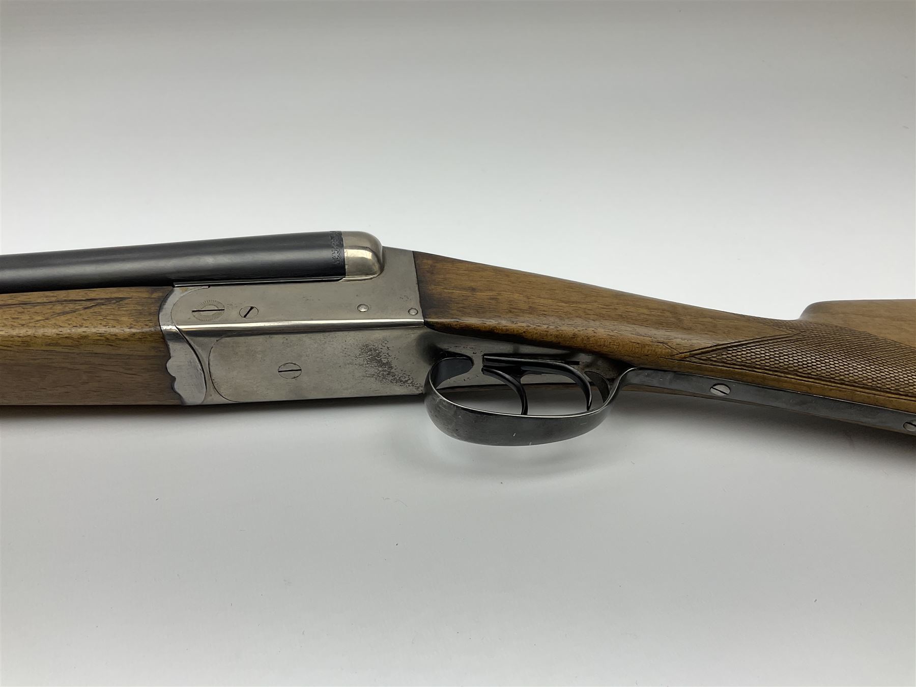 Spanish Master 12-bore side-by-side double barrel boxlock ejector sporting gun, 70.5cm barrels, pale walnut stock with chequered grip and plain fore-end and thumb safety, serial no.130828, L113cm SHOTGUN CERTIFICATE REQUIRED