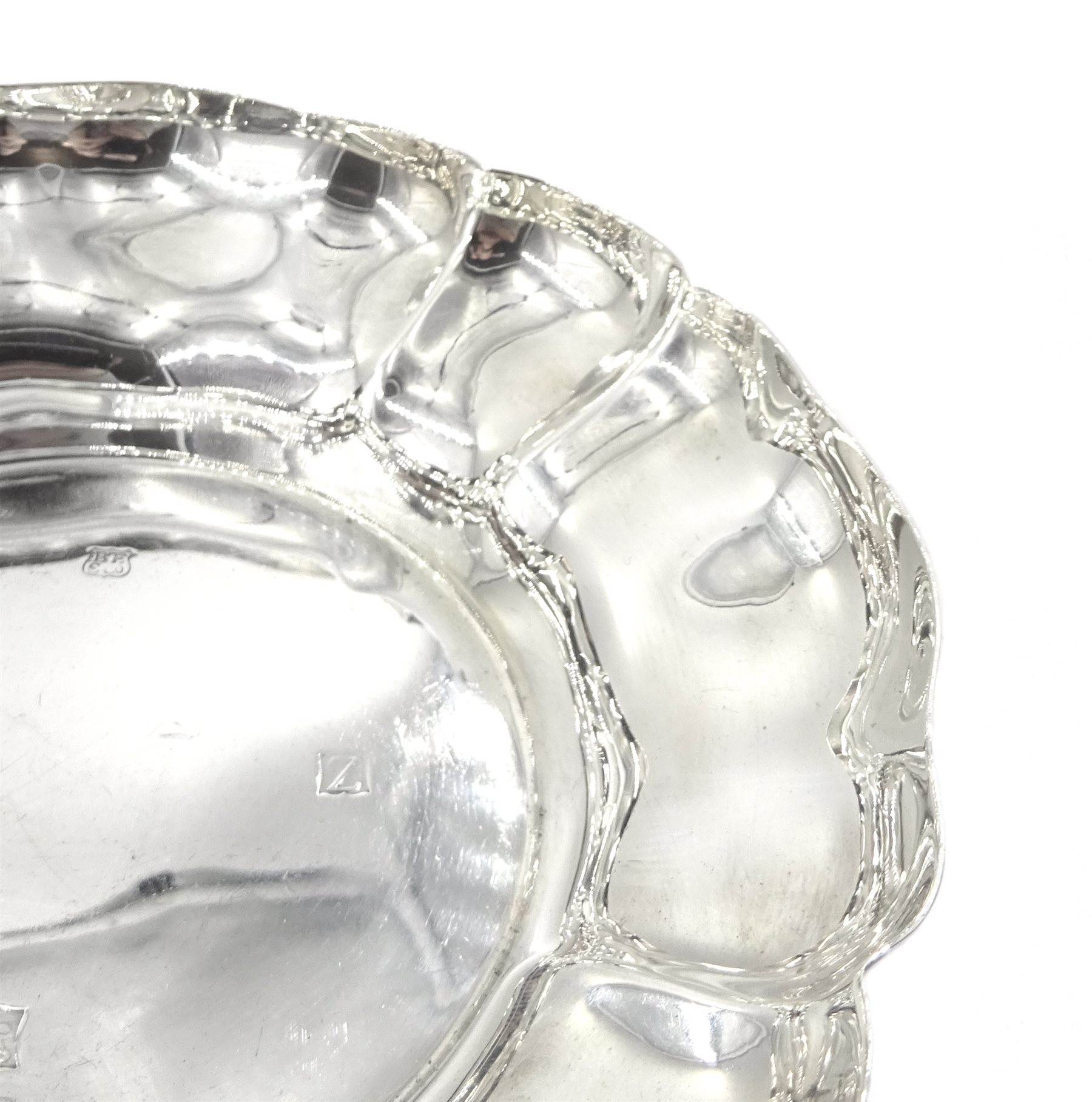 Silver dish by Barker Ellis Silver Co, Birmingham 1974, silver pedestal dish by E H P Co Ltd, Sheffield 1975 and one other, approx 14.2oz