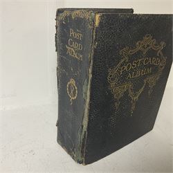Postcard album with Victorian and later postcards, including silk cards, landscapes of the UK, portraits, Christmas cards etc  